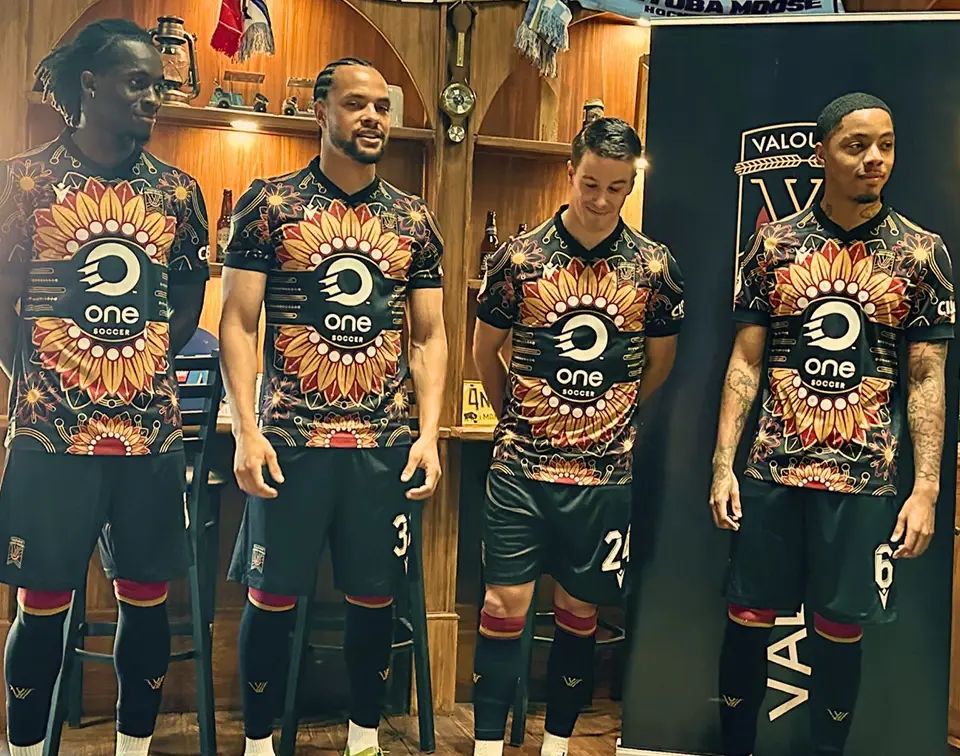 Members of the Winnipeg Valour FC soccer team wearing Indigenous-designed jerseys.