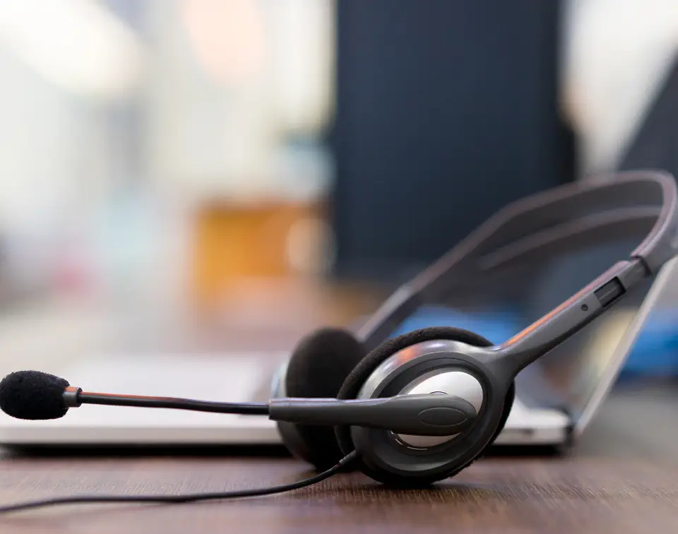 Call centre headset representing WolfStrata's customer service and 24/7 help desk support.